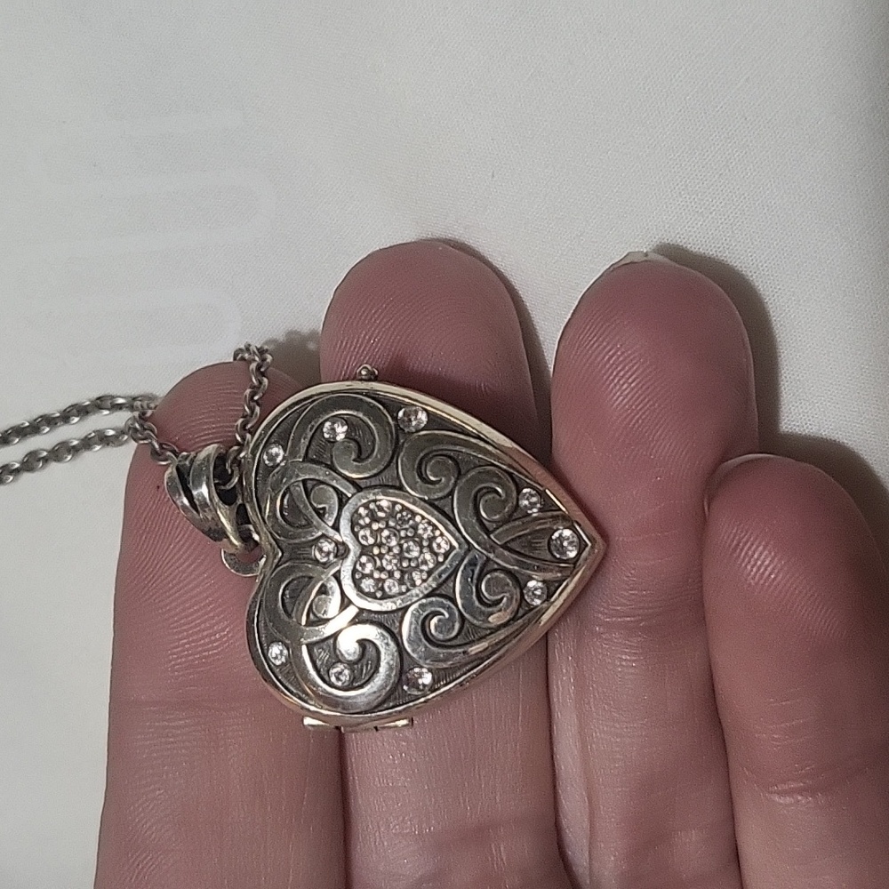Brighton heart locket on chain opens up to reveal two spaces 4 pictures